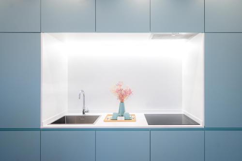 Dapur atau dapur kecil di Apartamentos Benicasim - La Casa Encendida