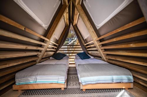 Letto o letti in una camera di Arena One 99 Glamping