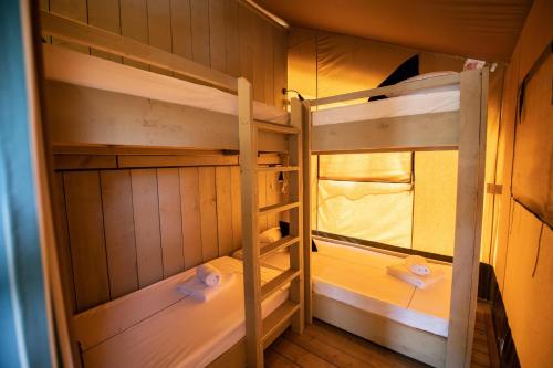 Letto o letti in una camera di Arena One 99 Glamping