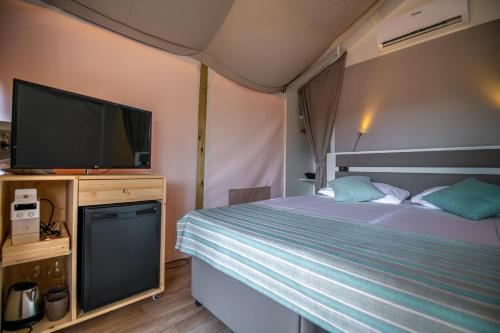 Letto o letti in una camera di Arena One 99 Glamping