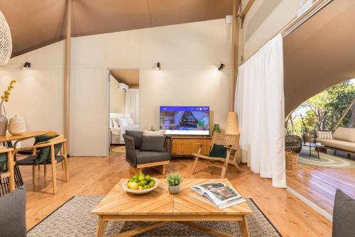 TV o dispositivi per l'intrattenimento presso Arena One 99 Glamping