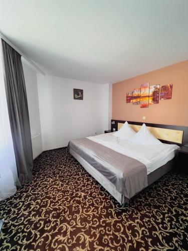 Ένα ή περισσότερα κρεβάτια σε δωμάτιο στο Hotel Neon