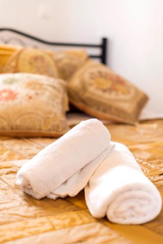 a piece of bread sitting on top of a table at Conchiglia Village House in Kiotari