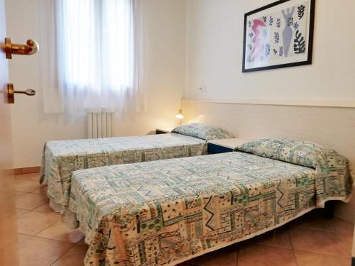 Ένα ή περισσότερα κρεβάτια σε δωμάτιο στο Le Ginestre