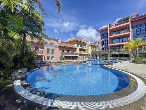 a large swimming pool in front of a building at The View by Atlantic Holiday in Funchal
