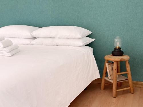 Säng eller sängar i ett rum på Villa Ramadia