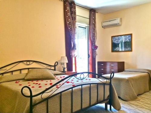 Postel nebo postele na pokoji v ubytování Park Hotel Paradiso