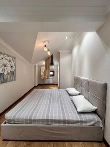 Katil atau katil-katil dalam bilik di Duplex Apartments