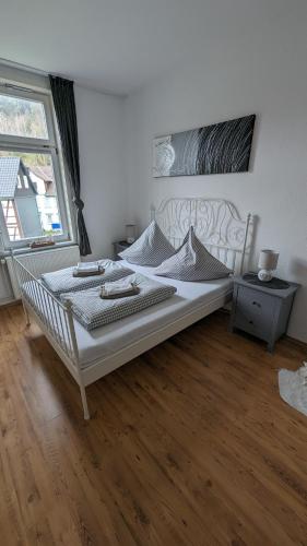 Katil atau katil-katil dalam bilik di Ferienwohnung Maiglöckchen