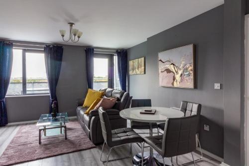 a living room with a couch and a table at GuestReady - Royal Canal Park Chic Getaway in Dublin