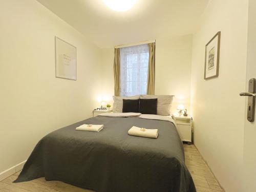 Ein Bett oder Betten in einem Zimmer der Unterkunft Residence Charles Bridge