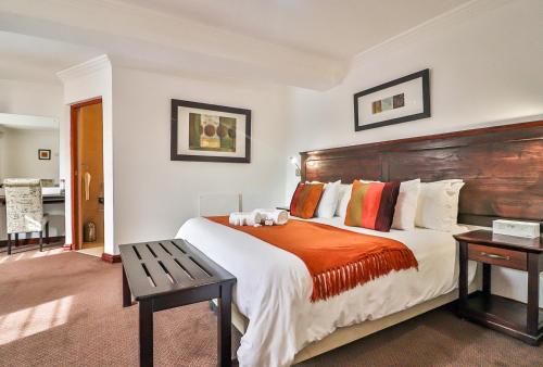 Ένα ή περισσότερα κρεβάτια σε δωμάτιο στο Kwantu Guesthouse 2