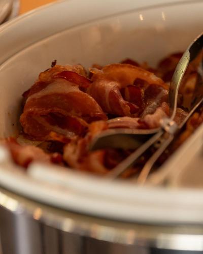 a close up of a bowl of food with a fork at Kyriad Lyon Sud Sainte Foy in Sainte-Foy-lès-Lyon