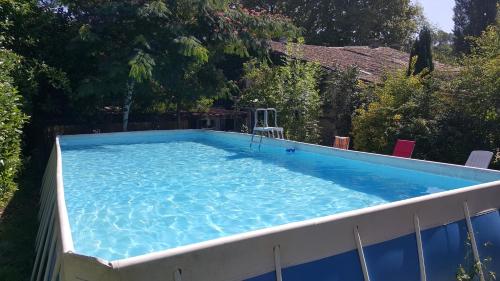 Bazén v ubytování Spacious holiday home with pool in pretty village nebo v jeho okolí