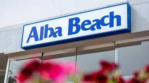 aania beech sign on the side of a building at MedPlaya Hotel Alba Beach in Benalmádena