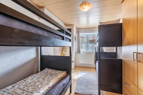 Ένα ή περισσότερα κρεβάτια σε δωμάτιο στο Ferienhaus em Biehl