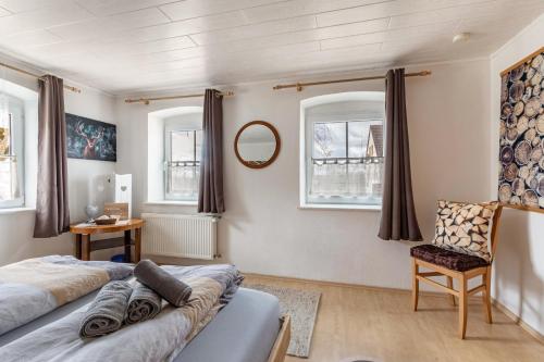 Ένα ή περισσότερα κρεβάτια σε δωμάτιο στο Ferienhaus em Biehl