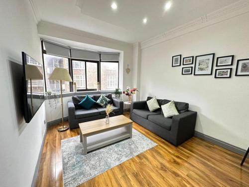 Zona de estar de Stylish 2 Bedroom Apartment Central London