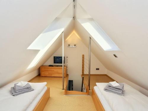 Ένα ή περισσότερα κρεβάτια σε δωμάτιο στο Kaphaus Modern retreat