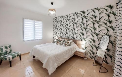 Ένα ή περισσότερα κρεβάτια σε δωμάτιο στο Nice Home In Linxe With Kitchen