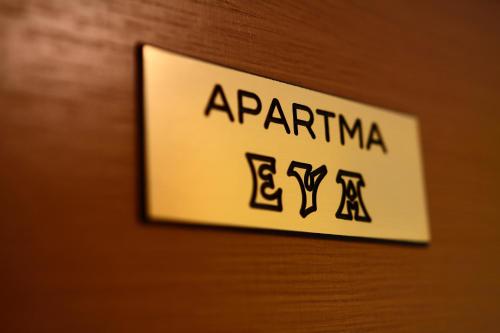 a sign on a door with the wordarma on it at Apartments at Gostilna Martin in Trbovlje