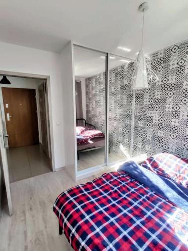 Voodi või voodid majutusasutuse Apartament Gdańsk toas