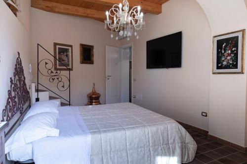 Ένα ή περισσότερα κρεβάτια σε δωμάτιο στο The House of Flowers