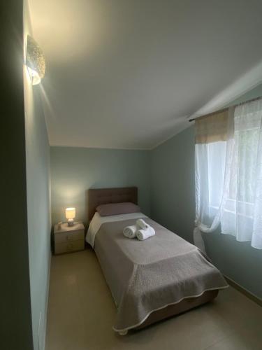 Postel nebo postele na pokoji v ubytování B&B La Terrazza