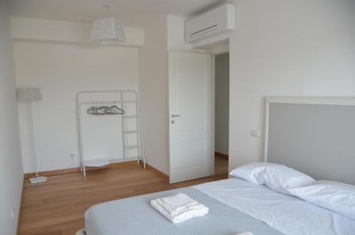 Postel nebo postele na pokoji v ubytování Suite 39 tra Roma e il mare