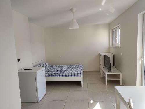 Ένα ή περισσότερα κρεβάτια σε δωμάτιο στο Bedroom