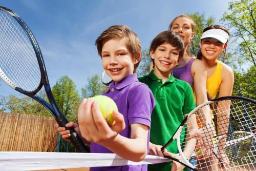 a group of children holding tennis balls and rackets at Superb 6 Berth Caravan At Broadland Sands Holiday Park In Suffolk Ref 20025Cf in Hopton on Sea