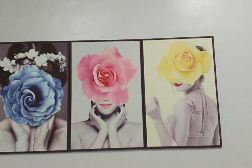 four pictures of a woman with flowers on them at Kings' Palms Residence02 in General Santos