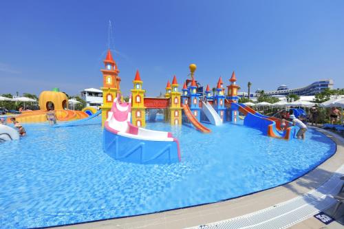 a large water park with a water slide at Sueno Hotels Deluxe Belek in Belek