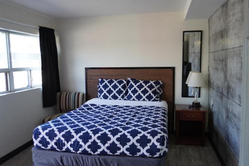Ένα ή περισσότερα κρεβάτια σε δωμάτιο στο Crestwood Motel