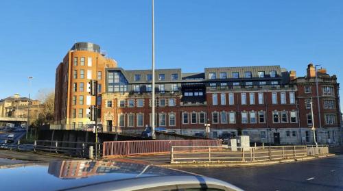 a view of a city with buildings and a street at Charming 1-Bed Apartment in Leeds in Leeds