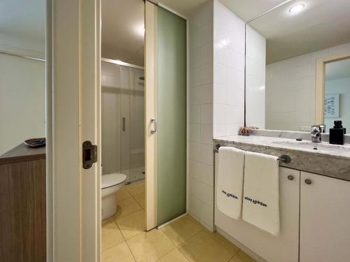 a bathroom with a toilet and a sink at Stay U-nique Apartments Pau Claris in Barcelona