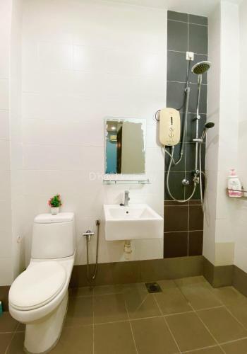 a bathroom with a toilet and a sink at Idaman Bayu Homestay 4 Bedrooms by DKAY in Sendayan in Seremban