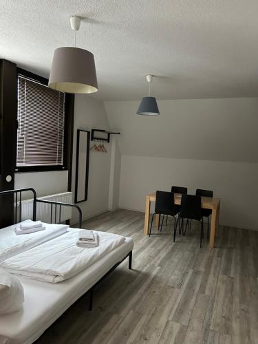 Postel nebo postele na pokoji v ubytování NB Apartments
