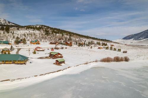 an aerial view of a village in the snow at Trout Trap at Henry's Lake in Island Park