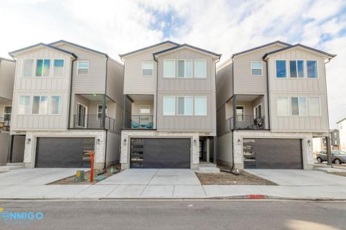 a large apartment building with three stories at Pooley Pad in American Fork