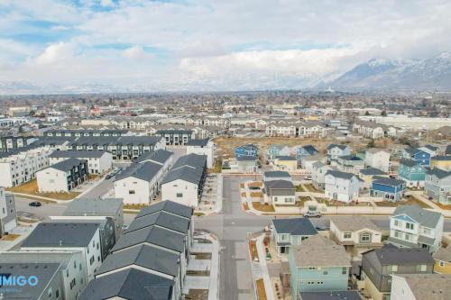 an aerial view of a city with buildings and mountains at Pooley Pad in American Fork