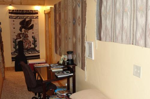 a room with a desk and a chair in a room at Breathtaking Views Close to Yellowstone in Island Park