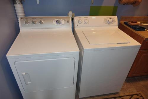 a white washer and dryer in a kitchen at Breathtaking Views Close to Yellowstone in Island Park