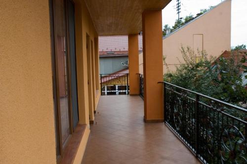 a corridor of a building with a balcony at Turul in Berehove
