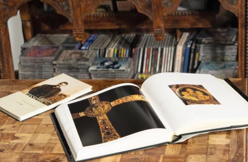 two books sitting on top of a table at Dimora Altana in Brescia