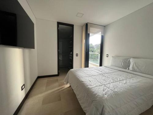 Postel nebo postele na pokoji v ubytování 402 - Beautiful Apartament In Heart Of El Poblado