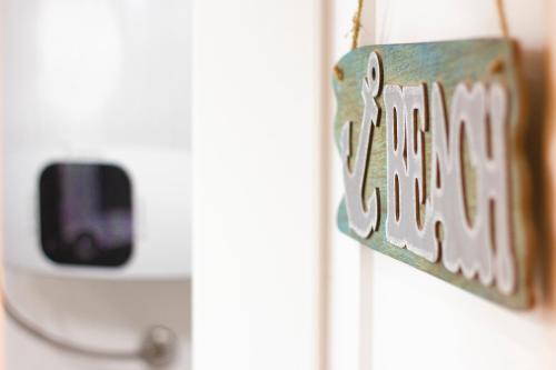a close up of a door with a sign on it at Lemon&Stone in Korčula