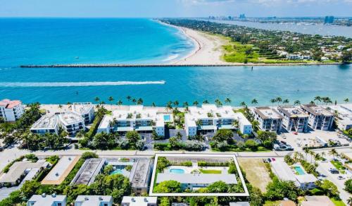 an aerial view of a beach with condos at Fernando Flats in Palm Beach Shores