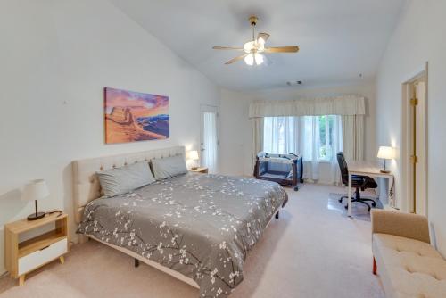 a bedroom with a bed and a desk at Page Home with Waterfall about 2 Mi to Lake Powell! in Page