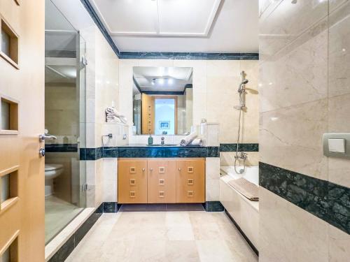 a bathroom with a sink and a shower at 111 - Penthouse Apartment, La Cala in Mijas